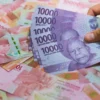 Rupiah Indonesia Capai Rekor Terendah, Presiden Minimalkan Dampak Sehari-hari