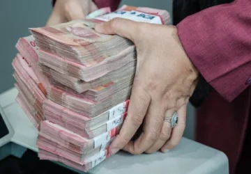 Jejak Perjalanan Selembar Rupiah: Membuktikan Kepercayaan Masyarakat