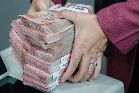 Jejak Perjalanan Selembar Rupiah: Membuktikan Kepercayaan Masyarakat