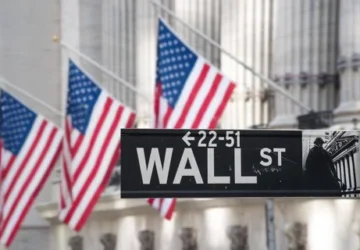 Wall Street Melemah Setelah The Fed Tahan Suku Bunga