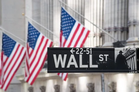 Wall Street Melemah Setelah The Fed Tahan Suku Bunga